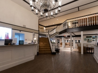 Front Desk lobby welcome California coast ocean views beach vibes leisure stay business travel